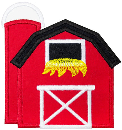 Red barn with a black roof and  silo