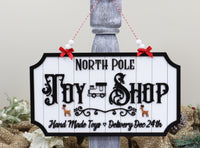 Handmade Christmas Wooden Sign "North Pole Toy Shop" - Sew Lucky Embroidery