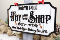 Handmade Christmas Wooden Sign "North Pole Toy Shop" - Sew Lucky Embroidery