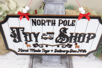 Handmade Christmas Wooden Sign "North Pole Toy Shop" - Sew Lucky Embroidery